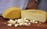 Handout picture released by Minas Gerais Culture Department (Secult-MG) shows a handmade Minas Cheese during an exhibition at the city of Belo Horizonte, Minas Gerais state, Brazil on October 19, 2024. (Photo by Renata Garbocci / Minas Gerais Culture Department (Secult-MG) / AFP) 