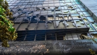 File: Burnt building of Bangladesh bridge authority is pictured after students set it on fire amid the ongoing anti-quota protest in Dhaka on July 19, 2024.  (Photo by Munir Uz Zaman / AFP)