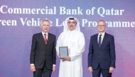 A Commercial Bank official receiving the award at the event.