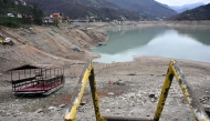 This photograph shows the shore of the Jablanicko artificial lake, through which the Neretva River flows, near the Bosnian town of Konjic, on December 5, 2024. Photo by ELVIS BARUKCIC / AFP