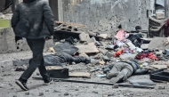 The bodies of victims lie amid the rubble in the courtyard of the Kamal Adwan hospital in Beit Lahya in the northern Gaza Strip, following a reported Israeli strike that hit the medical complex on December 6, 2024. Photo by AFP.