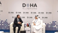 Minister of State for Foreign Affairs H E Sultan bin Saad Al Muraikhi meeting with Deputy Minister of Foreign Affairs of Poland and Under-Secretary of State for Security Policy H E Robert Kupiecki on the sidelines of the Doha Forum, yesterday.