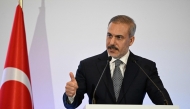 urkish Foreign Minister Hakan Fidan addresses the Doha Forum in the Qatari capital on December 8, 2024. (Photo by Mahmud HAMS / AFP)