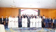 Officials pose for a group photo with the awardees during the honoring ceremony.