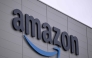 The logo of US online retail giant Amazon is seen on the facade of a redistribution centre in Horn-Bad Meinberg, western Germany, on December 9, 2024. (Photo by Ina FASSBENDER / AFP)

