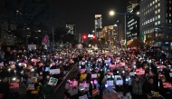 Protesters take part in a demonstration demanding President Yoon Suk Yeol's resignation outside the National Assembly in Seoul on December 10, 2024. Photo by Jung Yeon-je / AFP