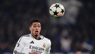 Real Madrid's English midfielder #05 Jude Bellingham runs for the ball during the UEFA Champions League football match between Atalanta and Real Madrid at the Gewiss Stadium in Bergamo, on December 10, 2024. (Photo by Marco Bertorello / AFP)