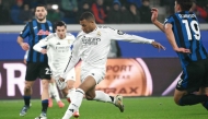 Kylian Mbappe shoots to score Real Madrid’s first goal against Atalanta.