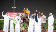 The connections of Dubawi Spectre celebrate after the Brooq Cup win. Pic: Juhaim/QREC