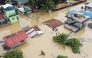 File: An aerial view shows submerged homes at a village in Ilagan, Isabela province on November 18, 2024, due to continuous heavy rains from Super Typhoon Man-yi. (Photo by Villamor Visaya / AFP)