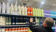 File: A man shops for Stanley cups and water drinking bottles from a fully-stocked supply at a sporting goods store in Pasadena, California, on January 24, 2024. (Photo by Frederic J Brown / AFP)

