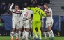 Manchester United players celebrate after Manchester United's Danish striker #09 Rasmus Hojlund (hidden) scored a goal during the UEFA Europa League football match between Viktoria Plzen and Manchester United in Plzen, Czech Republic on December 12, 2024. (Photo by Michal Cizek / AFP)