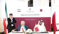 Minister of Commerce and Industry, H E Sheikh Faisal bin Thani bin Faisal Al Thani, and Minister of Energy of the Islamic Republic of Iran, H E Dr. Abbas Aliabadi, during the signing ceremony.