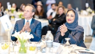 Founder and Chairperson of Al Faleh Educational Holding Dr Sheikha Aisha bint Faleh Al Thani (right) with other official and guests during the event.