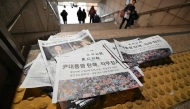 Extra edition newspapers are displayed at a subway station gate in downtown Seoul on December 14, 2024, after the impeachment motion against South Korean President Yoon Suk Yeol was passed. Photo by Jung Yeon-je / AFP