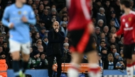 Manchester City's Spanish manager Pep Guardiola watches the players from the touchline during the English Premier League football match between Manchester City and Manchester United at the Etihad Stadium in Manchester, north west England, on December 15, 2024. (Photo by Paul ELLIS / AFP)