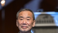 This picture taken on June 29, 2024 shows Japanese author Haruki Murakami posing during a photo call following a performance entitled the “Haruki Murakami produce Murakami JAM vol.3 – A hot and gentle fusion night”, at the Sumida Triphony Hall in Tokyo. Photo by Richard A. Brooks / AFP