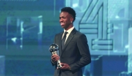 Vinicius Junior of Real Madrid poses for a photo after receiving the Best FIFA Men’s Player Award.