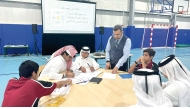 A teacher and students during an activity session in one of the Qatar Foundation schools.