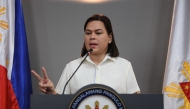 Philippine Vice-President Sara Duterte speaks during a press conference at her office in Manila on December 11, 2024. (Photo by TED ALJIBE / AFP)
