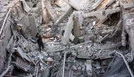 A man inspects the damage following an Israeli strike on a home belonging to the al-Zaytouniyah family, in the al-Daraj neighbourhood in Gaza City, in the central Gaza Strip on December 19, 2024. (Photo by Omar AL-QATTAA / AFP)
