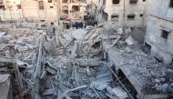 People look for survivors following an Israeli strike on a home belonging to the al-Zaytouniyah family, in the al-Daraj neighbourhood in Gaza City, in the central Gaza Strip on December 19, 2024. Photo by Omar AL-QATTAA / AFP