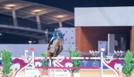 Qatari rider Bassem Hassan Mohammed guides F One Usa over a fence during the Big Tour of Longines Hathab Qatar Equestrian Tour at Al Shaqab yesterday.