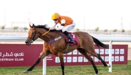 Gavin Matt Ryan guides Kerindia towards the finish line in the Sawda Natheel Stakes Thoroughbred race. PIC: Juhaim/QREC