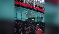 A photograph taken on December 22, 2024 shows a picture of Manchester United's English striker #10 Marcus Rashford celebrating outside Old Trafford in Manchester, north west England, on December 22, 2024 ahead of the English Premier League football match between Manchester United and Bournemouth. (Photo by Darren Staples / AFP) 