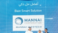 Minister of Communications and Information Technology, H E Mohammed bin Ali Al Mannai presenting the award to Vice Chairman of the Executive Committee at Mannai Corporation, Khalid Mannai.