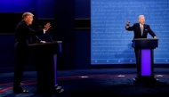 File: US President Donald Trump and Democratic presidential nominee Joe Biden participate in their first 2020 presidential campaign debate held on the campus of the Cleveland Clinic at Case Western Reserve University in Cleveland, Ohio.