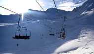 (FILES) Skiers sit on chairlifts at Sainte-Anne, a small ski resort near La Condamine-Chatelard, in the French Alps, on January 6, 2024. (Photo by Nicolas TUCAT / AFP)
