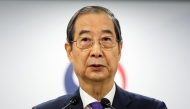 South Korea Prime Minister and acting President Han Duck-soo speaks in his address to the nation at the Government Complex in Seoul on December 26, 2024. Photo by YONHAP / AFP