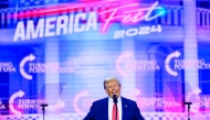 US President-elect Donald Trump speaks during Turning Point's annual AmericaFest 2024 in Phoenix, Arizona, on December 22, 2024. (Photo by JOSH EDELSON / AFP)
