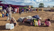 Sudanese people fleeing the Jazirah district arrive at a camp for the displaced in the eastern city of Gedaref on October 31, 2024. (Photo by AFP)