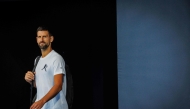 Serbian Novak Djokovic arrives to attend a training session before the Brisbane International tennis tournament in Brisbane on December 28, 2024. (Photo by Patrick Hamilton / AFP) / 