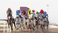 Action during the End Of Year Cup at Al Uqda Racecourse yesterday. PICS: Juhaim/QREC