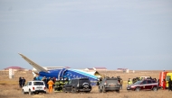 Scene from the crash site of an Azerbaijan Airlines passenger jet near the western Kazakh city of Aktau on December 25, 2024. (Photo by Issa Tazhenbayev / AFP)