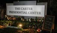 A memorial sprung up at The Carter Presidential Center following the death of Jimmy Carter on December 29, 2024 in Atlanta, Georgia. Megan Varner/Getty Images/AFP 