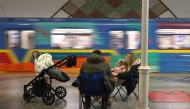 Local residents take shelter in a metro station during an air strike alarm in Kyiv on December 31, 2024, amid the Russian invasion of Ukraine. (Photo by Anatolii STEPANOV / AFP)
