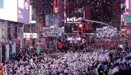 Revelers celebrate the New Year at Times Square in New York City, just after midnight on January 1, 2025. (Photo by Leonardo Munoz / AFP)