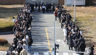 Mourners wait to pay their respects for the victims of the Jeju Air Boeing 737-800 aircraft on January 1, 2025. (Photo by YONHAP / AFP)