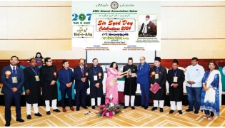 Ambassador of India to Qatar H E Vipul (fifth right) with other officials and guests during the event.