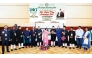 Ambassador of India to Qatar H E Vipul (fifth right) with other officials and guests during the event.