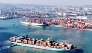 Photo used for representational purposes. A cargo ship loaded with containers sails from the Qingdao port in Qingdao, in eastern China's Shandong province on December 26, 2024. Photo by AFP.
