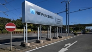 File: An entrance sign for Japanese company Nippon Steel's East Nippon Works Kashima Area facility is pictured in Kashima, Ibaraki prefecture, north of Tokyo on December 6, 2024.  (Photo by Richard A Brooks / AFP)