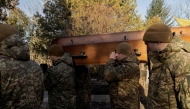 Ukrainian soldiers carry the coffin of late Ukrainian serviceman Danylo Bobrykov, callsign 