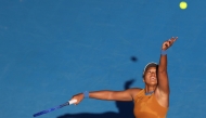 Japan's Naomi Osaka serves against USA's Alycia Parks during their women's singles semi-final match at the WTA Auckland Classic tennis tournament in Auckland on January 4, 2025. (Photo by Michael Bradley / AFP)
