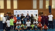 Caption for Group photo: Officials of Qatar Foundation, Generation Amazing Foundation, Paris Saint-Germain, and the participants pose for a photograph at the launch of the first international launch of PSG’s ‘One Team - Onze de Légende’ programme at the Education City in Doha, yesterday. All pictures: Salim Matramkot/The Peninsula 