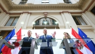 (FILES) (L-R) The leader of Austria's social democratic SPOe party Andreas Babler, the leader of Austria's conservative OeVP party, Austria's Chancellor Karl Nehammer and the leader of Austria's liberal NEOS party Beate Meinl-Reisinger address a press conference following talks on forming a new government, on November 18, 2024 in Vienna, Austria. (Photo by HELMUT FOHRINGER / APA / AFP) / Austria OUT
